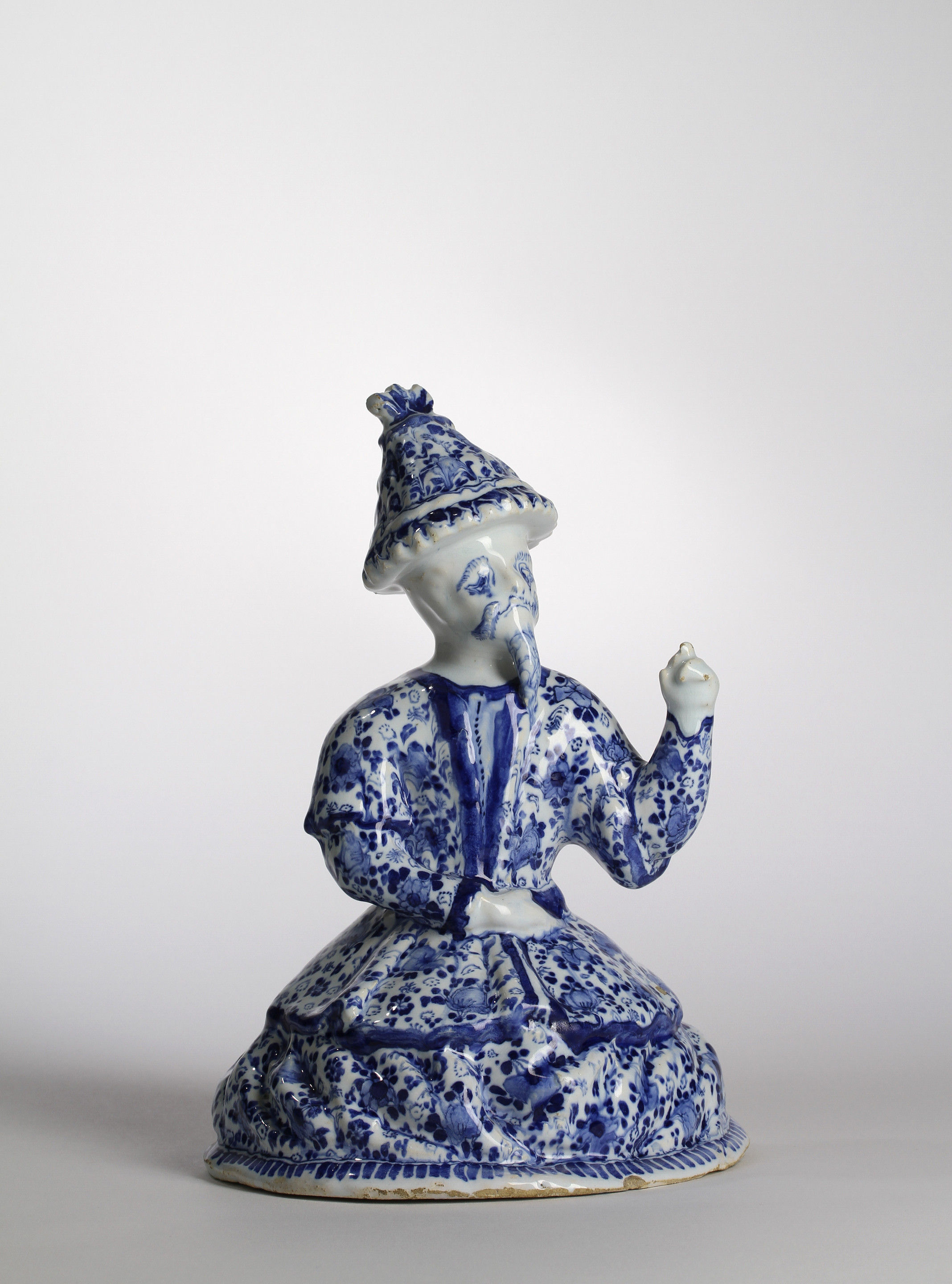 A BERLIN BLUE AND WHITE FAIENCE FIGURE OF A CHINAMAN Gerhard Wolbeer’s Factory